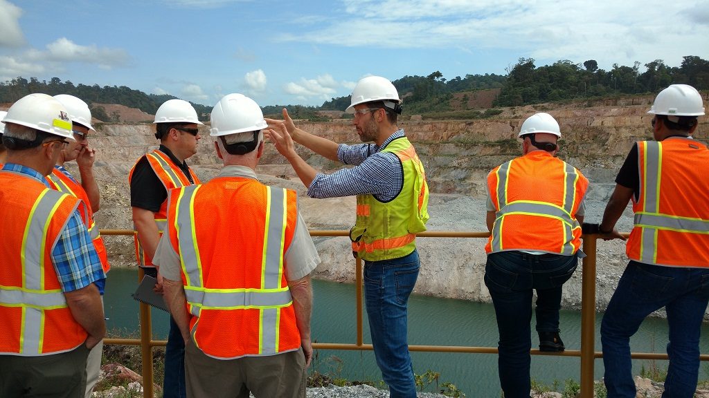 Michel Payeur, manager of mine technical services at Iamgold's Rosebel gold mine in Suriname, (centre) leads of tour of the Rosebel mine. Photo by John Cumming.