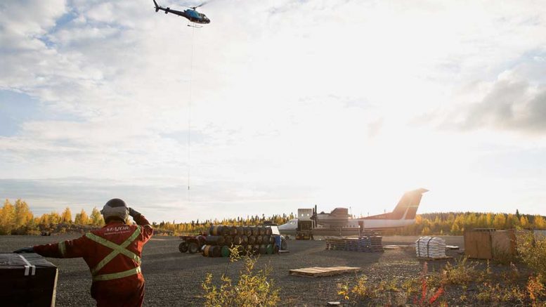 A helicopter above the airstrip at Nighthawk Gold’s Indin Lake gold project in the Northwest Territories. Credit: Nighthawk Gold.