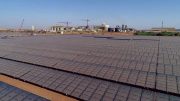 Solar panels in front of processing facilities at Iamgold’s Essakane gold mine in Burkina Faso. Credit; Iamgold.