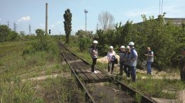 Examining rail infrastructure built alongside Black Iron's Shymanivske iron ore deposit near Kryvyi Rih, Ukraine. Photo by John Cumming.