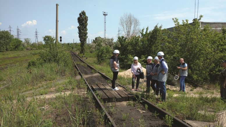 Examining rail infrastructure built alongside Black Iron's Shymanivske iron ore deposit near Kryvyi Rih, Ukraine. Photo by John Cumming.