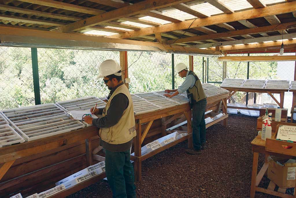 Workers logging core at Mexican Gold’s Las Minas project in Mexico. Credit: Mexican Gold.