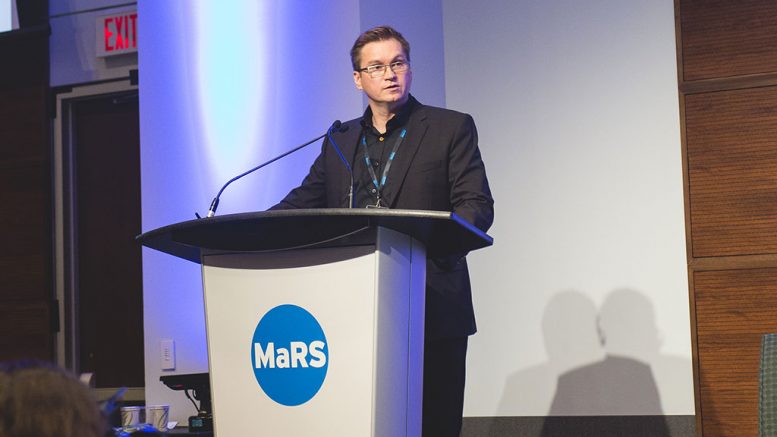 Sandvik's business line manager for automation Mikko Koivunen speaks at the Progressive Mine Forum. Photo by George Matthew Photography.