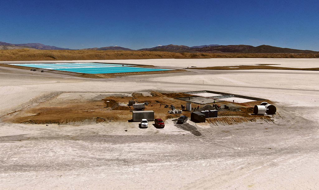 The pilot plant under construction at Pastos Grandes, with evaporation ponds in the background. Credit: Millennial Lithium.