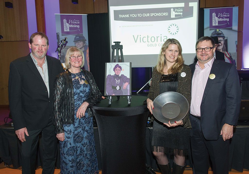 Banyan Gold president and CEO Tara Christie (holding award) accepts the Yukon Women in Mining Kate Carmack Award in 2018 for excellence in championing women within the industry, alongside (from left) her brother Seamus Christie, mother Dagmar Christie and husband John McConnell. Credit: Yukon Women in Mining.