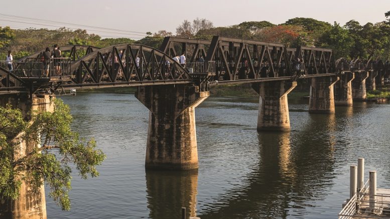 The River Kwai Bridge in Kanchanaburi, Thailand, which was part of the railway from Bangkok to Myanmar, also known as the Railway of Death, built during World War II. Credit: iStock/DannyMark.