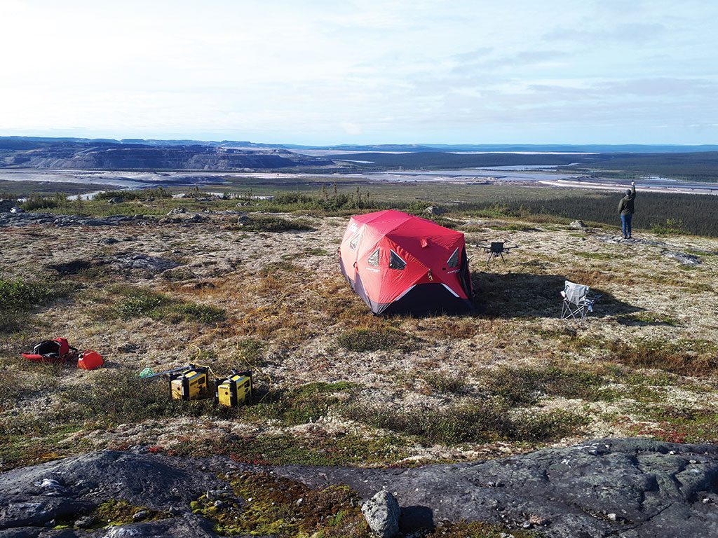 A launch and observation site during the UAV survey at Bloom Lake East. A UAV operator must be in direct visual contact with the drone in flight. Credit: Pioneer Aerial Surveys.