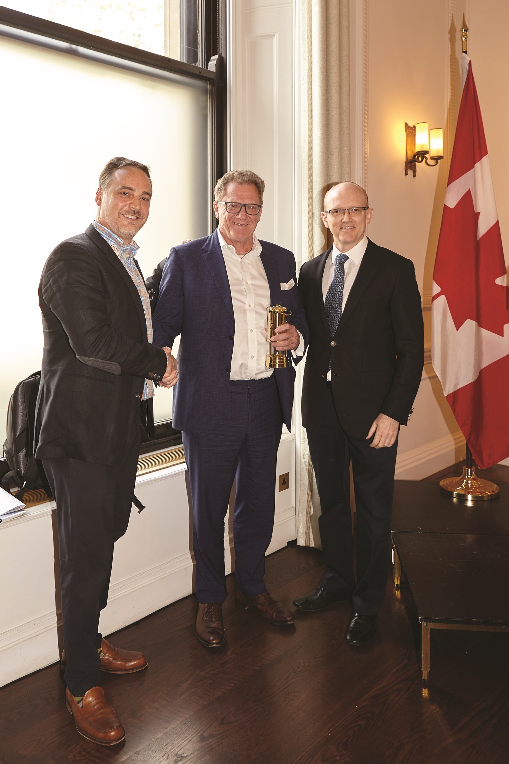 From left: Anthony Vaccaro, group publisher, The Northern Miner; Nicholas Mather, CEO, SolGold, holding his 2018 Northern Miner ‘Mining Person of the Year’ award; and John Cumming, editor-in-chief, The Northern Miner. Photo by Martina Lang for The Northern Miner.