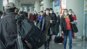 Travellers at Beijing Capital International Airport in January 2020. Credit: XiFotos/iStock.
